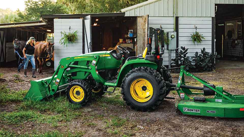 rancher on the farm with 3025 compact tractor