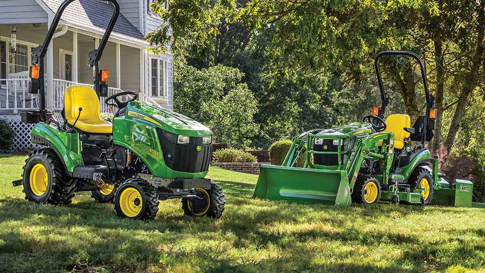 John Deere 1025R and 1023E in Lawn