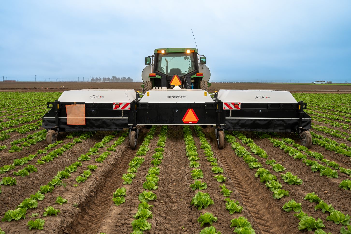 Ecorobotix equipment spraying lettuce