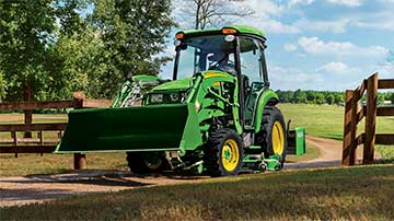 John Deere 3039r tractor with bucket, box blade and mower deck