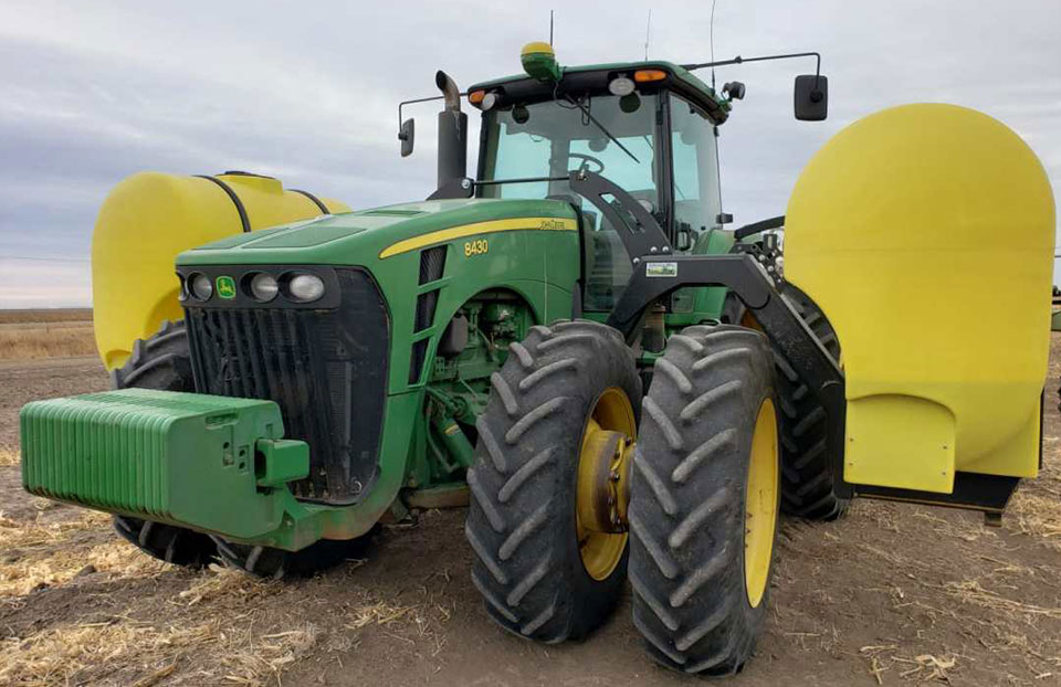 John Deere 8430 Tractor with Spray tanks on either side