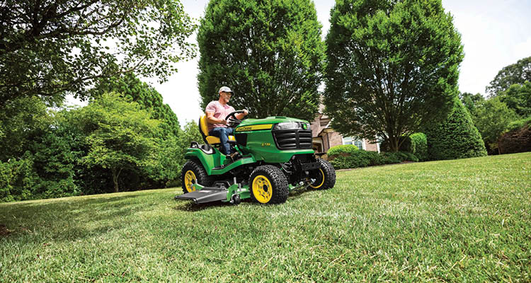 Man Driving X739 John Deere Riding Lawn Tractor