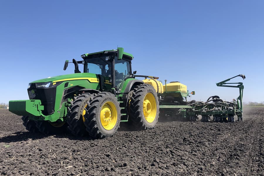 Tractor and planter in field