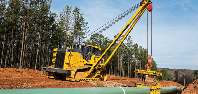 John Deere equipment installing a pipeline