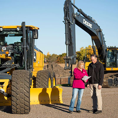 john deere construction machinery being sold