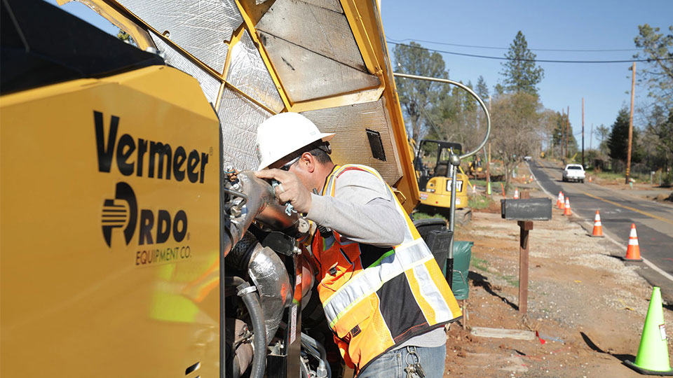 field service technician performing repair