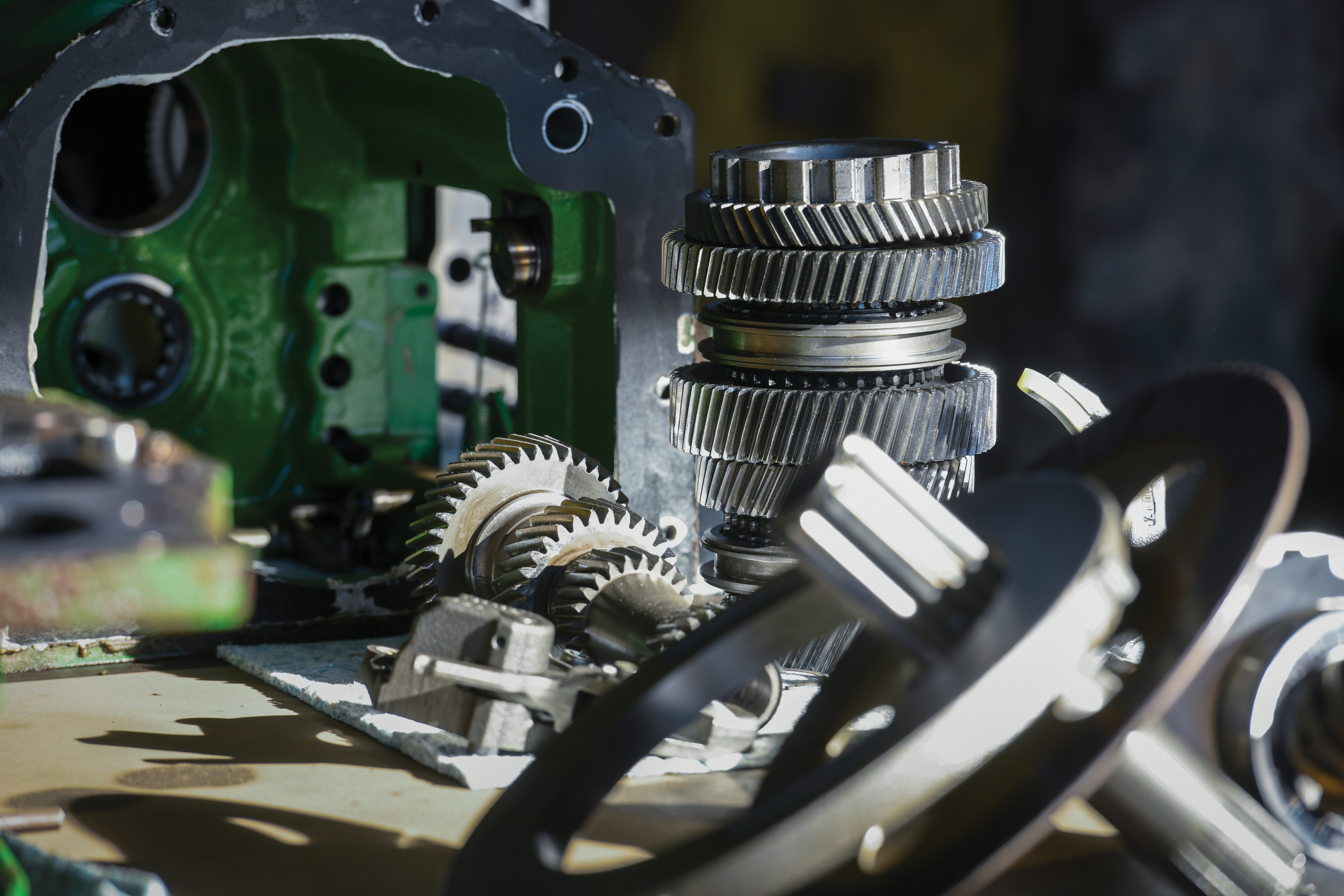 John Deere Equipment Parts laid out in a display