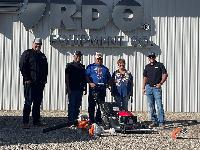 From left:  Store Manager Steven Daniloff, Lead Parts Specialist Steve Garcia, Lorenzo Miranda, representative from the America Legion Mrs. Campos, and RSM Chris Bostic.