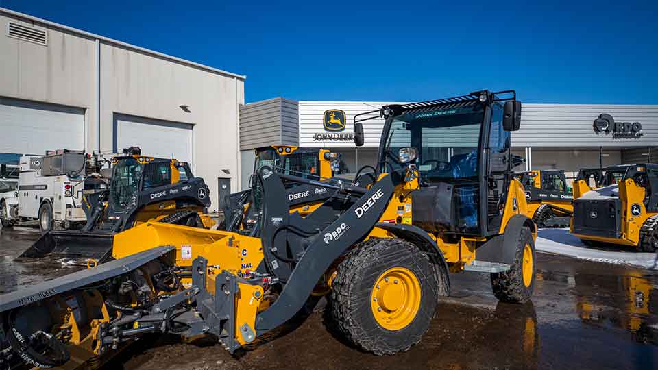 Compact loader in heavy equipment lot Compact loader in heavy equipment dealer lot