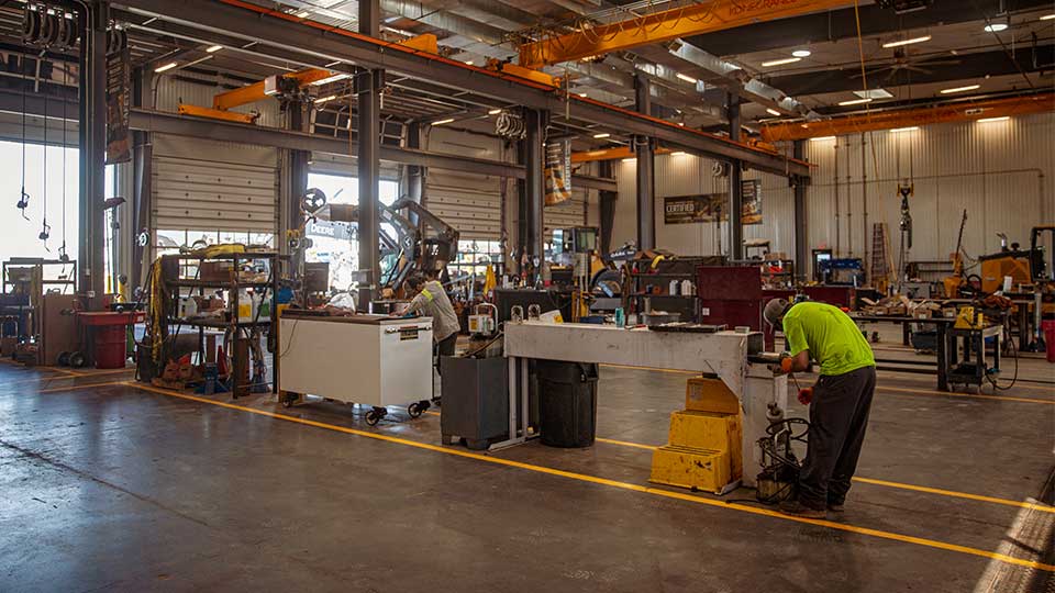 Service Technicians working in Heavy Equipment Service Shop