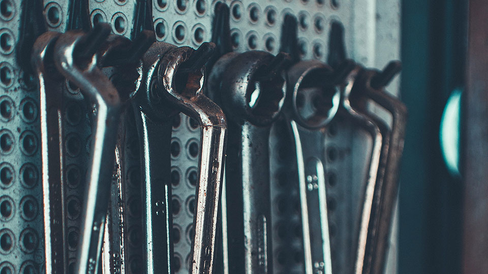 socket wrenches hanging on the wall