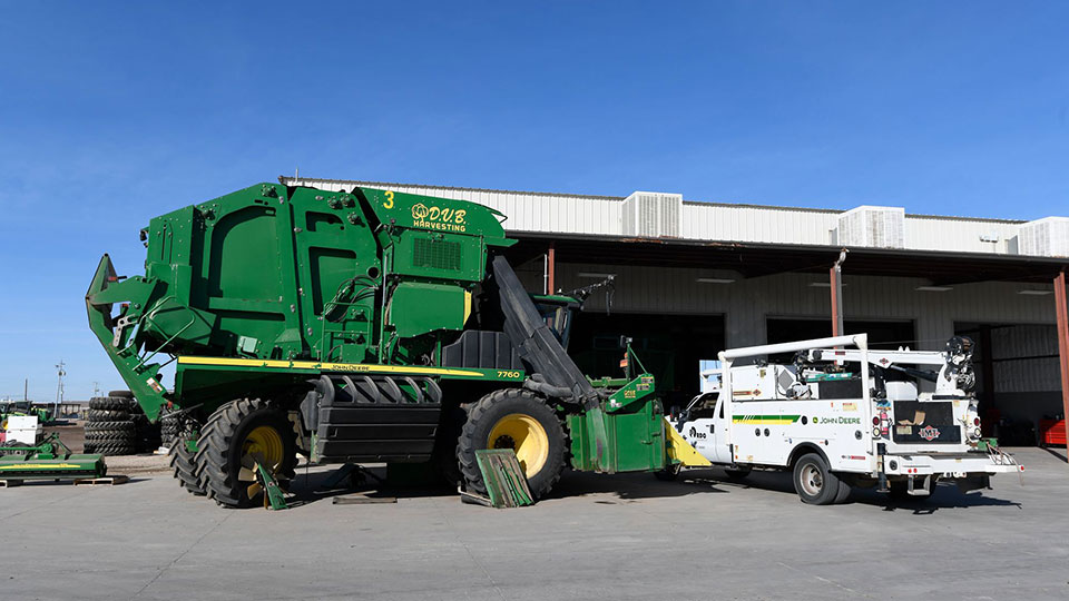 field service truck parked at contractor building