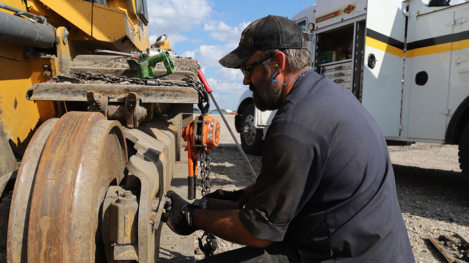 field technician performing repair