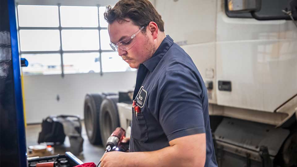 service technician working in shop