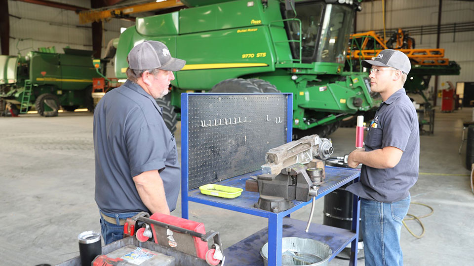 service manager talking with service technician