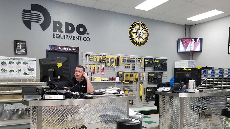 Parts person behind parts counter at RDO store