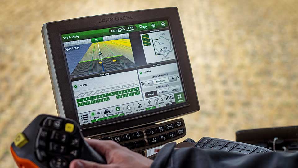 precision agriculture machinery showing see and spray screen