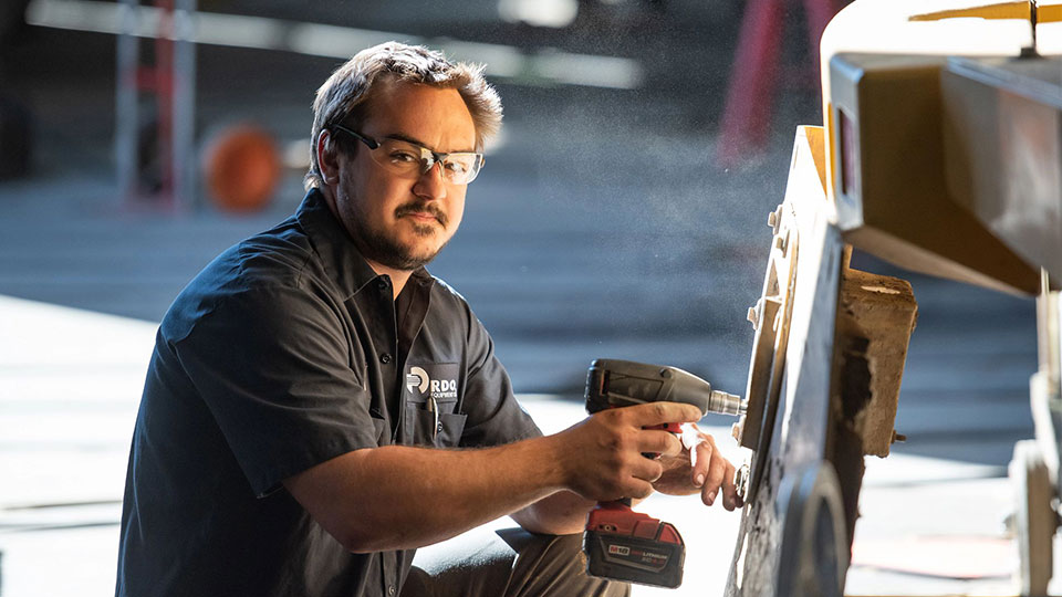 service technician working on repair