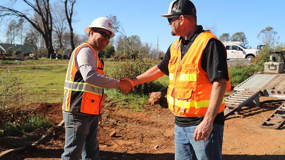 Vermeer Account Manager Shaking hands with contractor