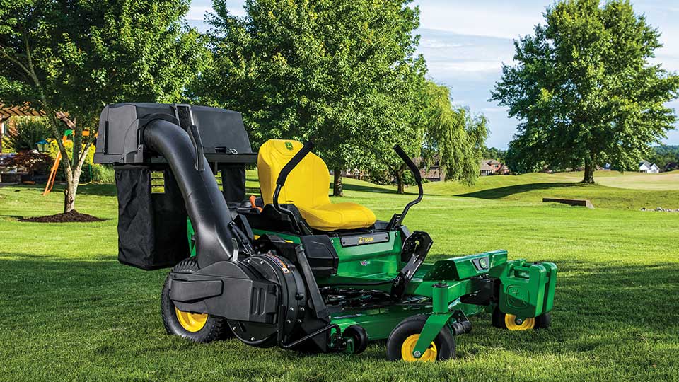 John Deere zero-turn mower with bagger on golf course